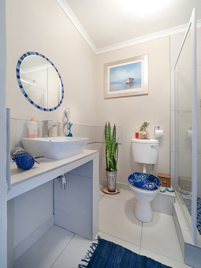 designer bathroom ideas blue lid cover on toilet