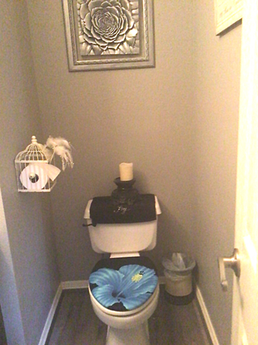 brendas other toilet lid cover with a big blue flower