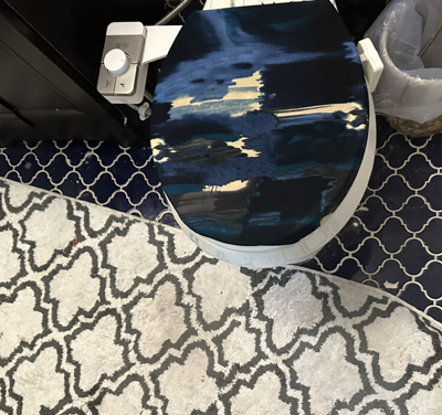 black and blue wavey design toilet seat lid cover by grey white floor