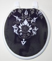 round black and white toilet seat cover